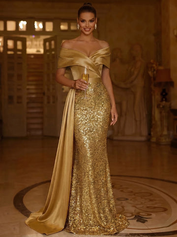 Vedress gold sequin mermaid evening dress with a folded off-shoulder neckline and long side drape, front view.