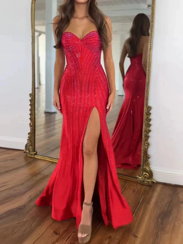 Vedress red sparkly mermaid prom dress with a strapless sweetheart neckline, curved embellishments, and high leg slit, front view.