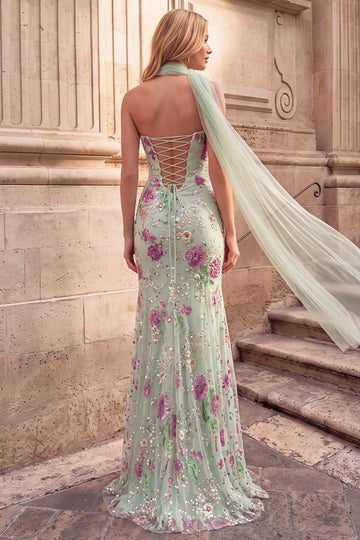 Back view of Roselledress floral sequin prom dress featuring an open lace-up back, trailing ties and a softly flared hem.