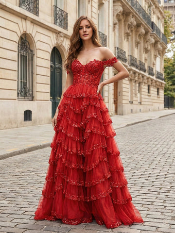 Red A-line prom dress with a sweetheart neckline, off-shoulder sleeves, beaded floral appliqués and tiered tulle ruffles.