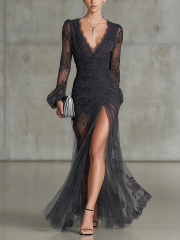 Vedress black lace evening dress with a deep V-neck, sheer long sleeves, ruched bodice and high leg slit.