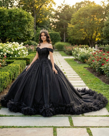 Vedress black off the shoulder quinceañera ball gown with lace beading and ruffle train front view