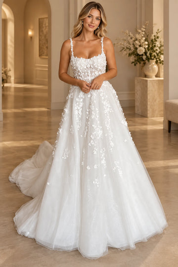 Vedress A-line wedding dress with a scoop neckline, floral straps, sheer-effect bodice and floral appliqués, front view.
