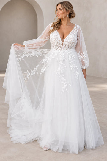 Front view of floral A-line tulle wedding dress with V-neckline and sheer long sleeves
