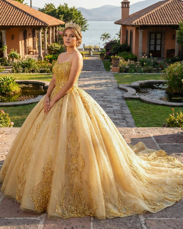 Vedress gold quinceañera dress, spaghetti strap ball gown with ornate gold embroidery and glitter tulle skirt with train