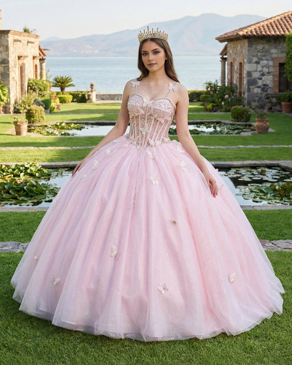 Vedress light pink glitter tulle quinceañera dress front view, spaghetti strap sweetheart ball gown with 3D butterfly appliques and beaded corset bodice