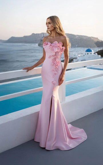 Front view of a pink floral wedding guest dress with a strapless sweetheart neckline and fitted mermaid skirt