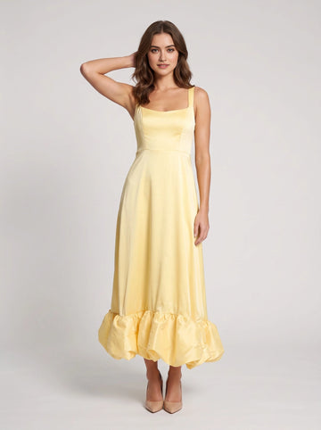 Pale yellow A-line square neck sleeveless maxi wedding guest dress with ruffle hem by Vedress