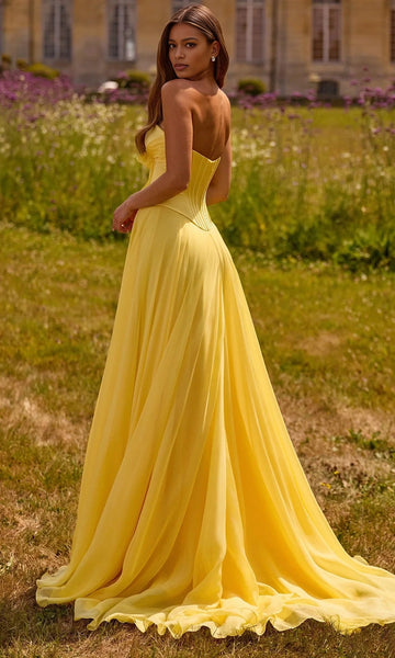 Yellow floor-length prom dress with V-shaped corset back and flowing A-line skirt