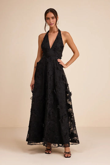 A-line halter V-neck sleeveless maxi dress with lace embroidery, 3D floral applique details, open back, fitted bodice, and flowing skirt