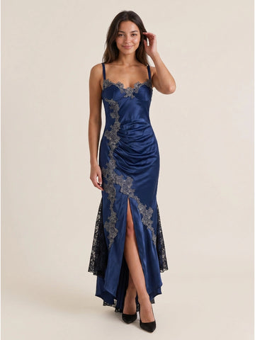 Navy blue satin mermaid prom dress with sweetheart neckline, floral lace appliques, ruched bodice, front slit and asymmetrical maxi skirt