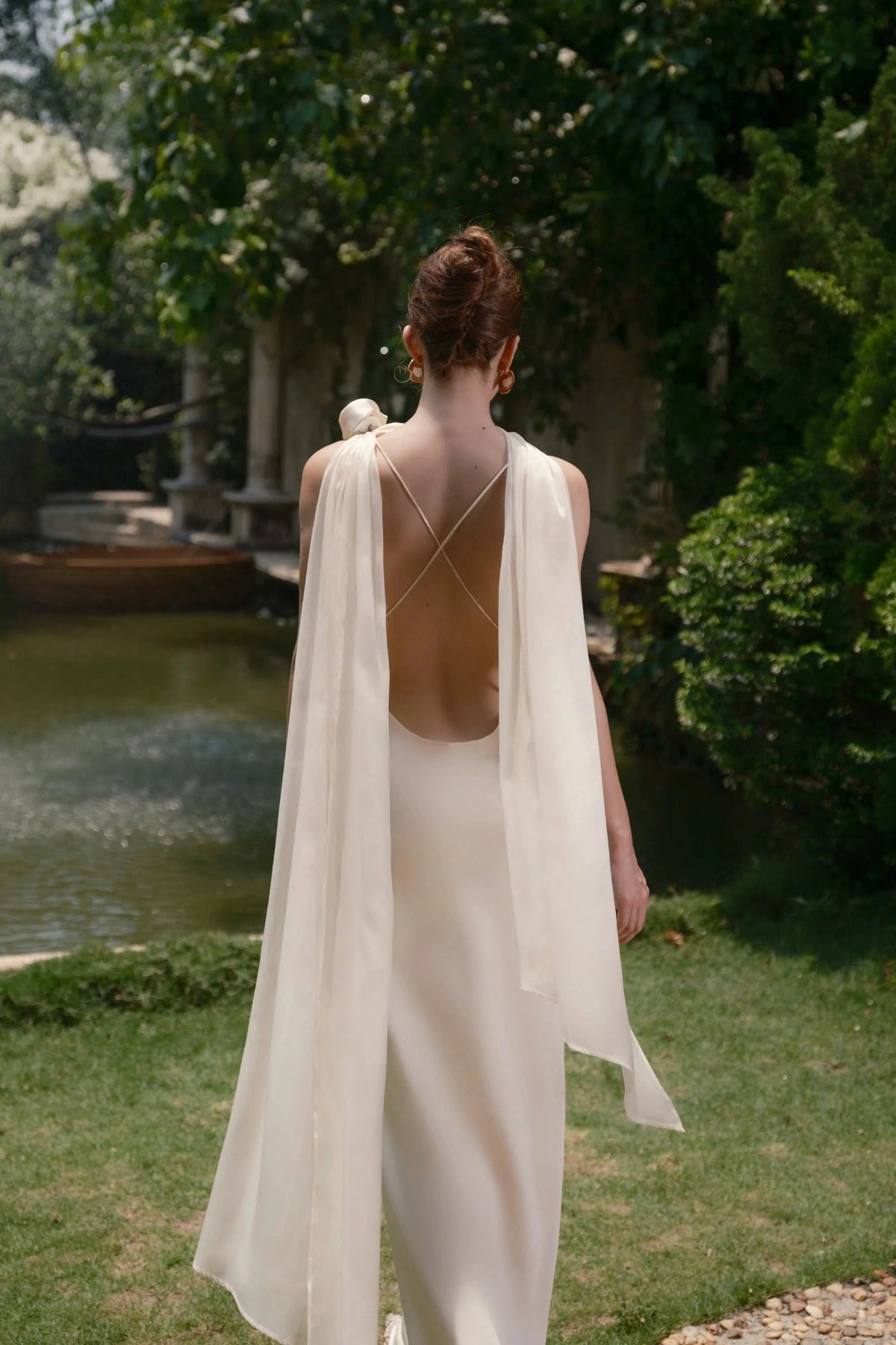 Elegant Sheath One‑Shoulder Sleeveless Cross‑Back Floor‑Length Wedding Dress