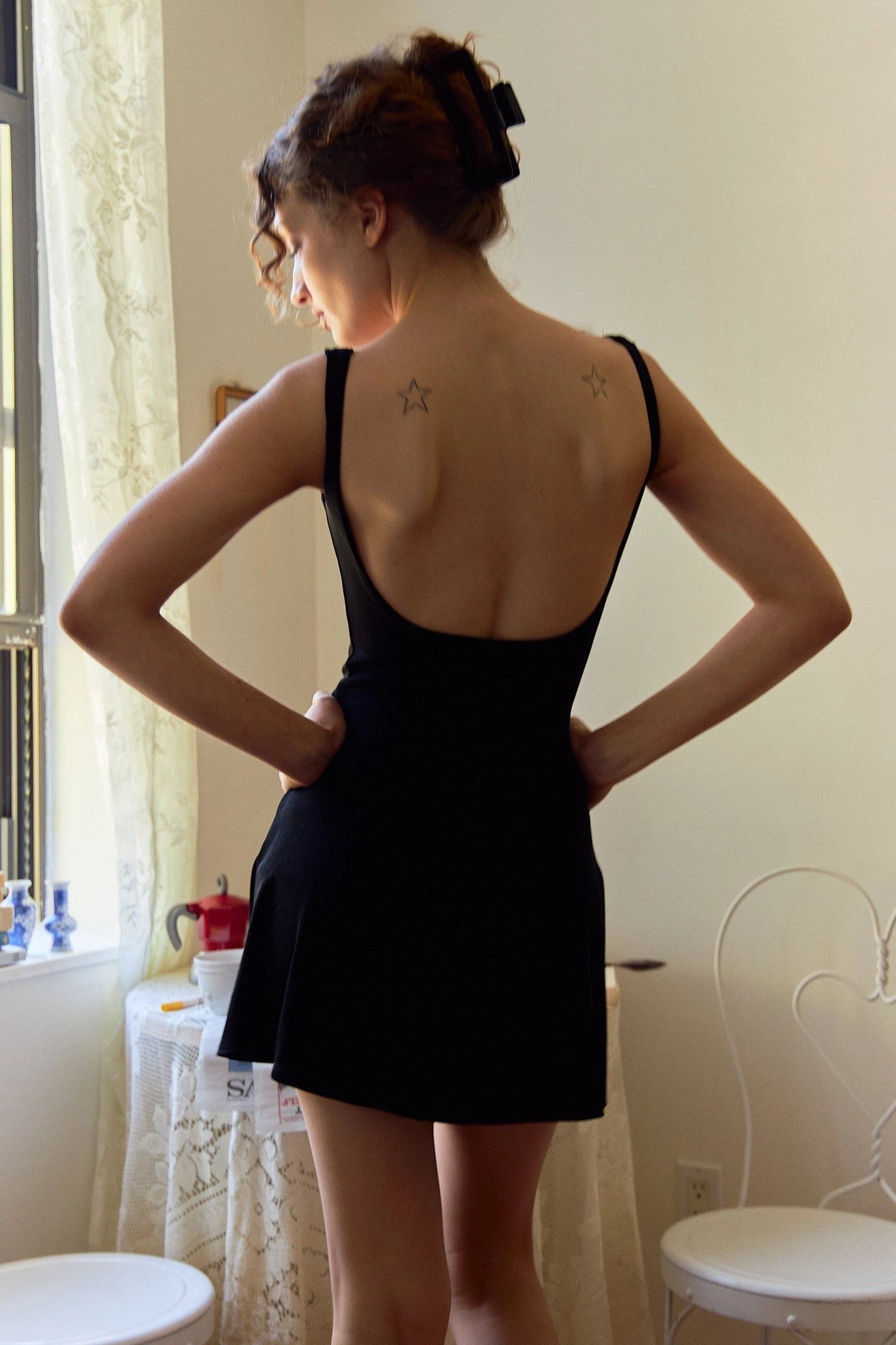 Sleek A‑Line U‑Neck Sleeveless Low‑Back Mini Homecoming Dress