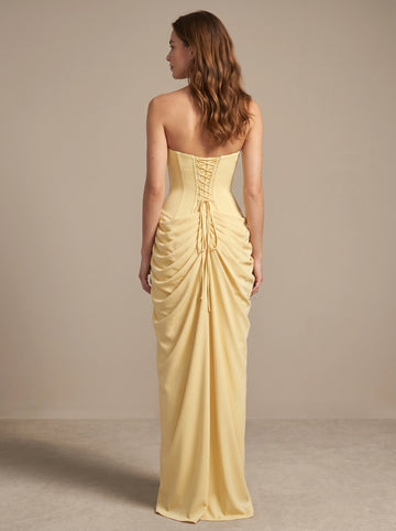 Vedress yellow formal gown,back view corset crisscross lace‑up tie‑back,ruched draped waist details,long flowing chiffon skirt,neutral studio backdrop