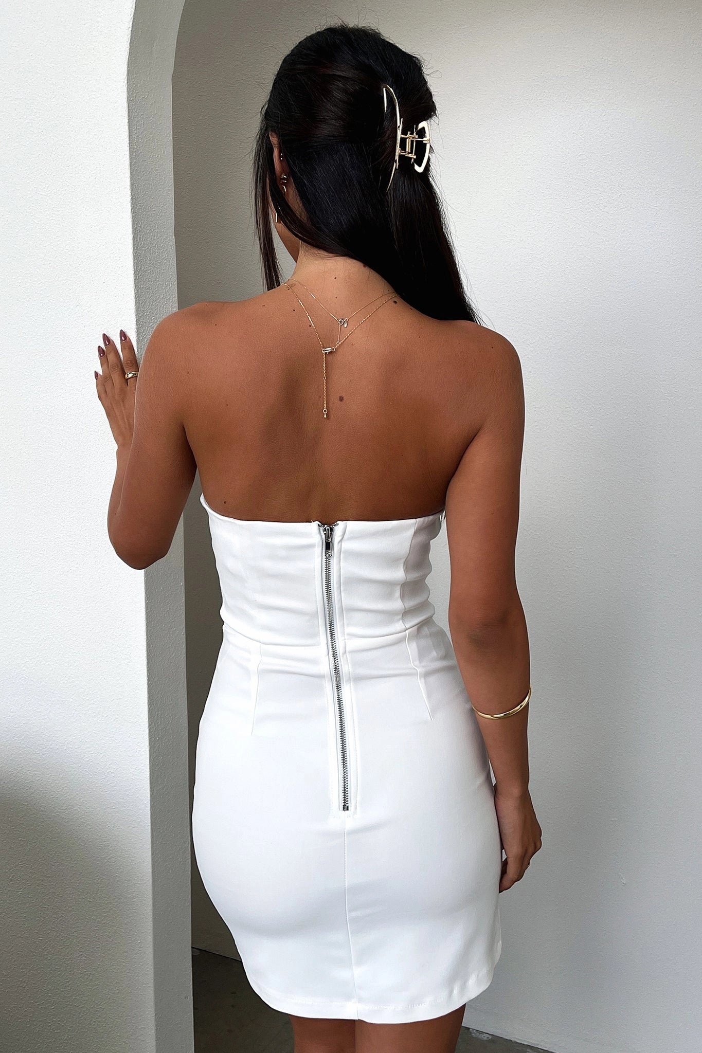 Vedress strapless mini dress back view exposed silver zipper closure