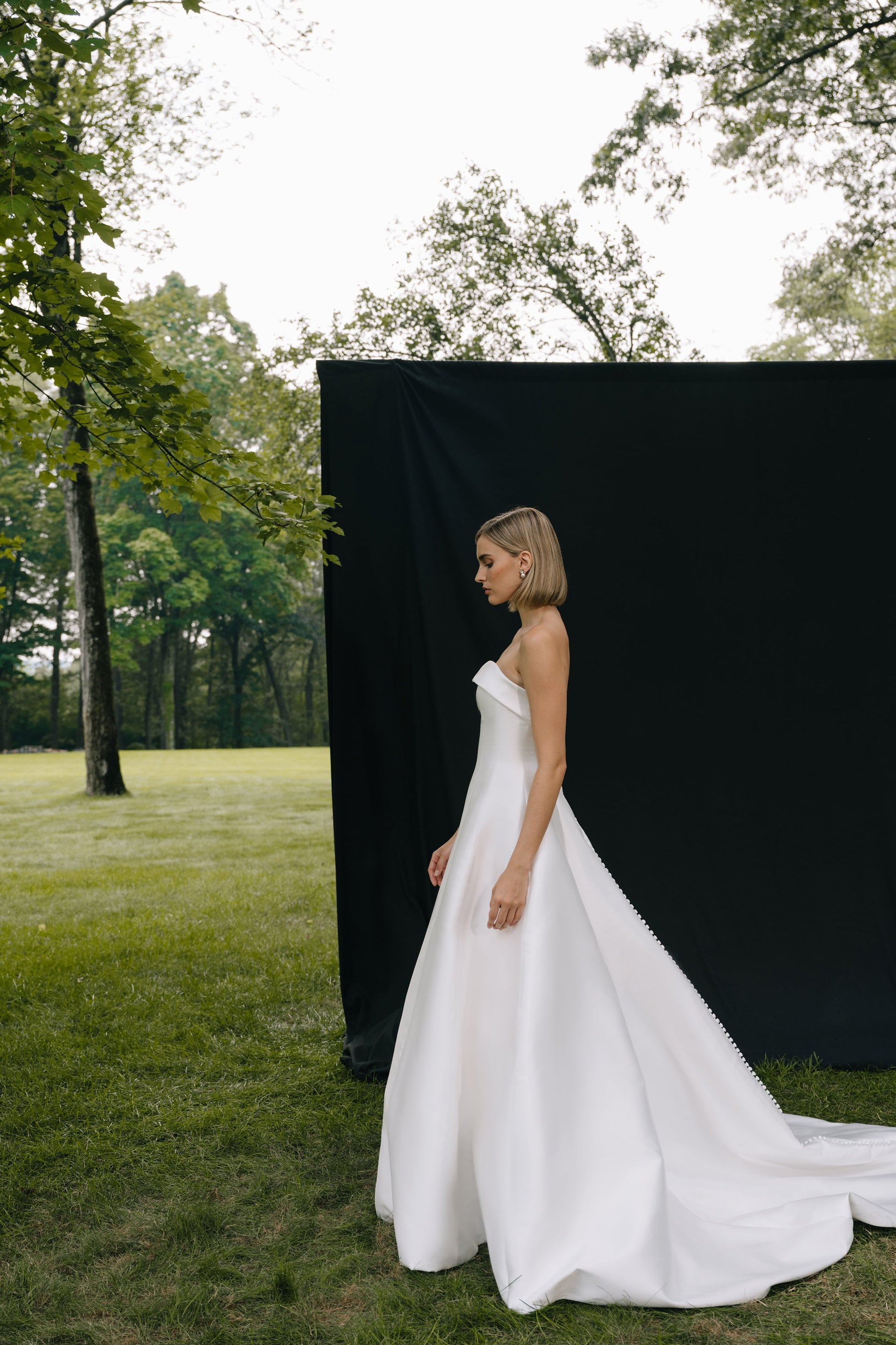 Minimalist Ballgown Strapless Sleeveless Button Back Cathedral Train Wedding Dress