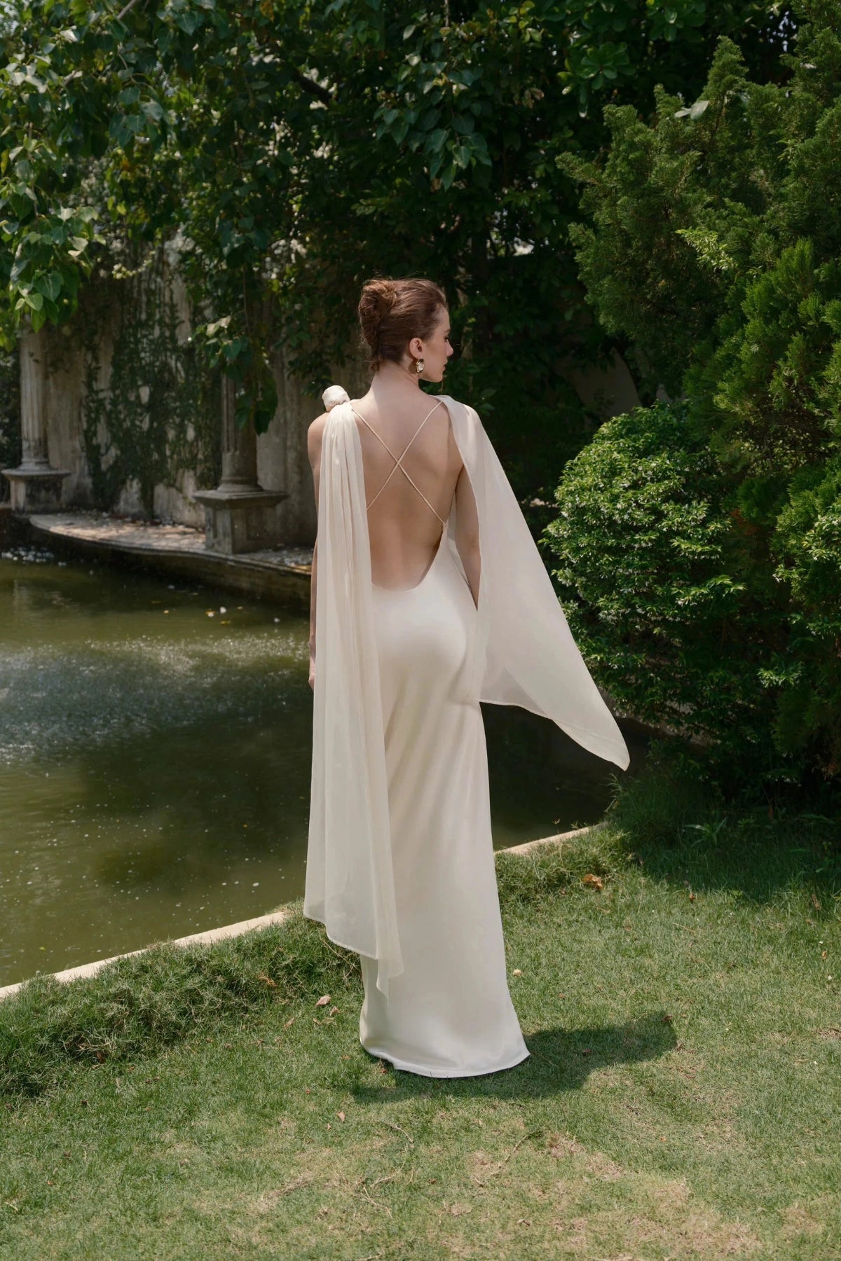 Elegant Sheath One‑Shoulder Sleeveless Cross‑Back Floor‑Length Wedding Dress