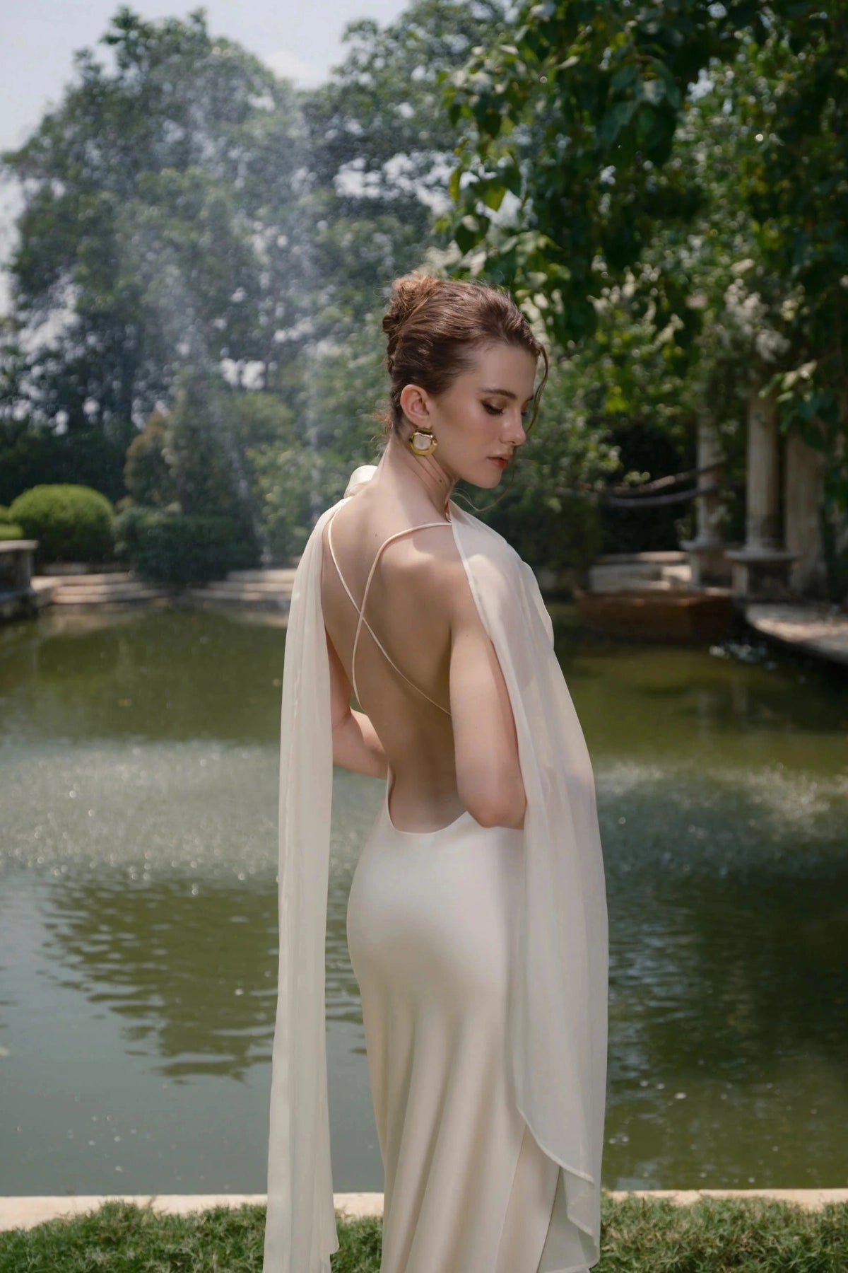 Elegant Sheath One‑Shoulder Sleeveless Cross‑Back Floor‑Length Wedding Dress