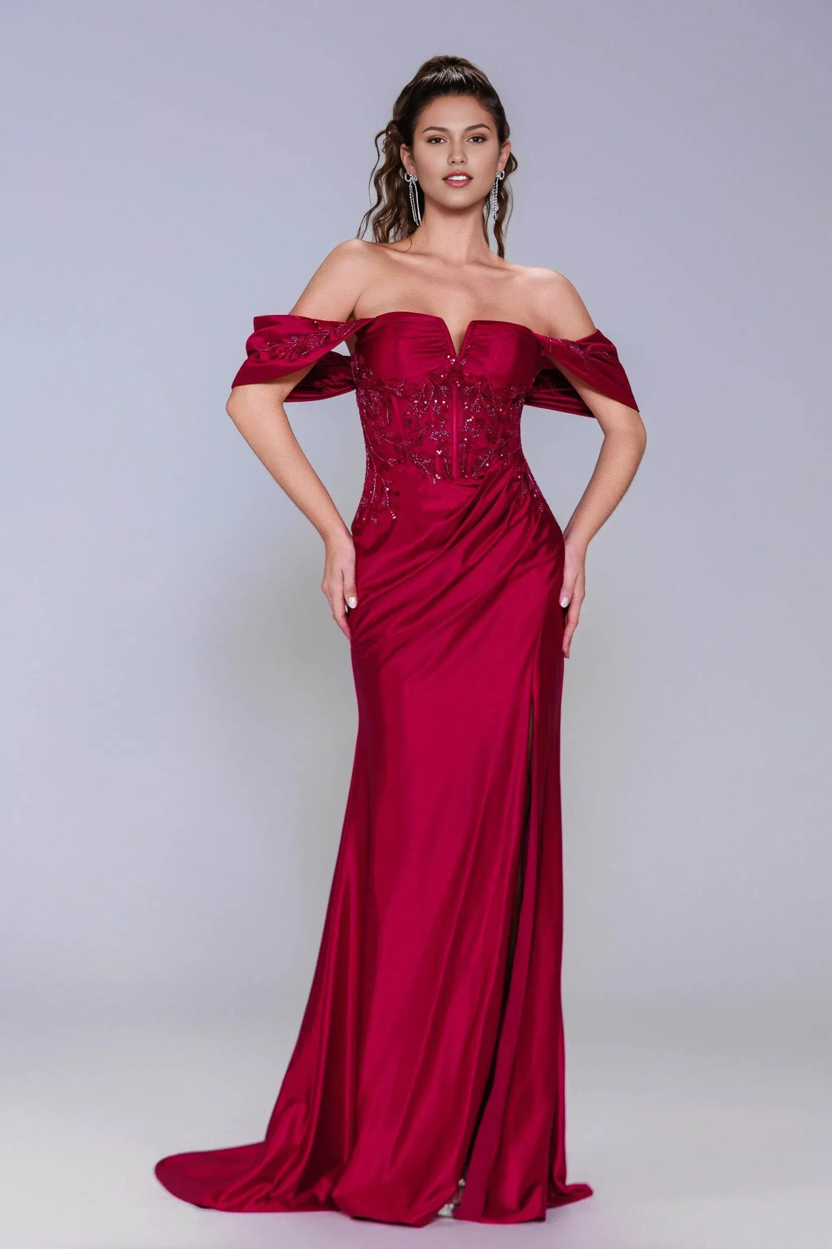 Sheath evening gown with sweetheart neckline, off-shoulder draped sleeves, appliqué bodice, and front slit