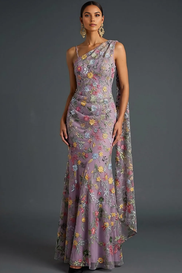 one-shoulder floral embroidered tulle evening gown with draped cape detail and mermaid silhouette