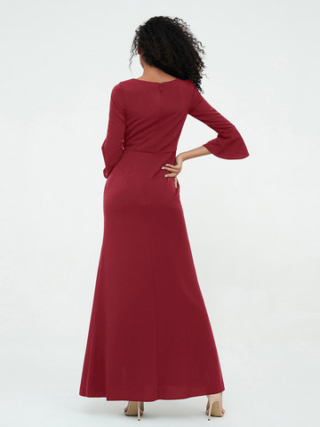 Back view of red long sleeve formal evening dress with zipper closure, fitted waist, and full-length column skirt