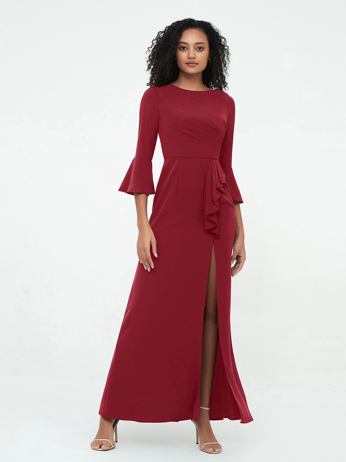 Red column formal evening dress with round neckline, three-quarter bell sleeves, side ruffle detail, and front slit