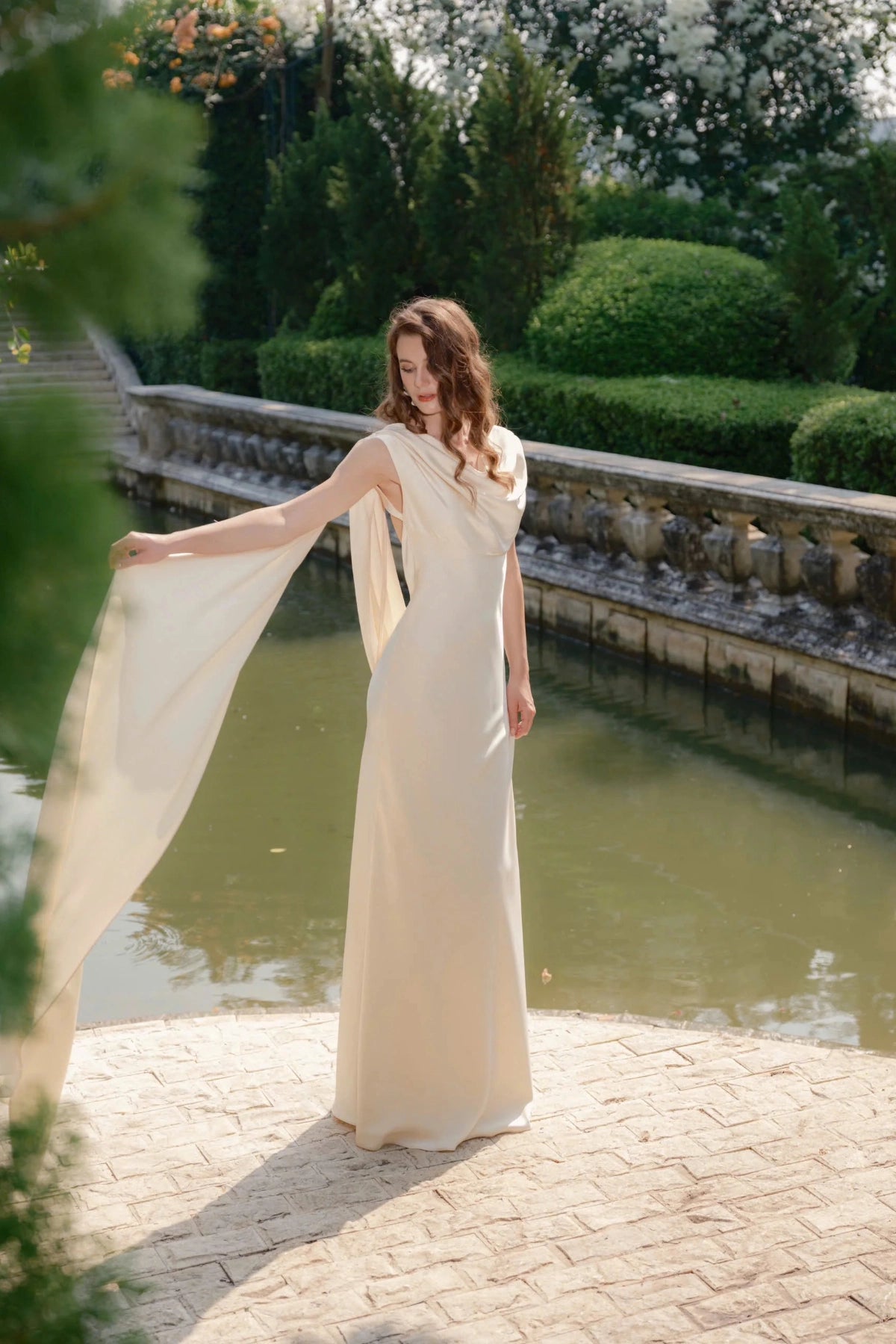 Luxury Sheath Cowl Sleeveless Open Back Floor‑Length Wedding Dress
