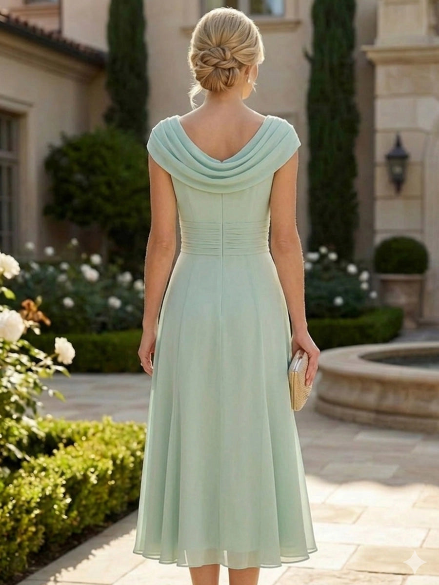 Model wearing vedress soft sage green wedding guest dress cap sleeve zip back long formal outfit