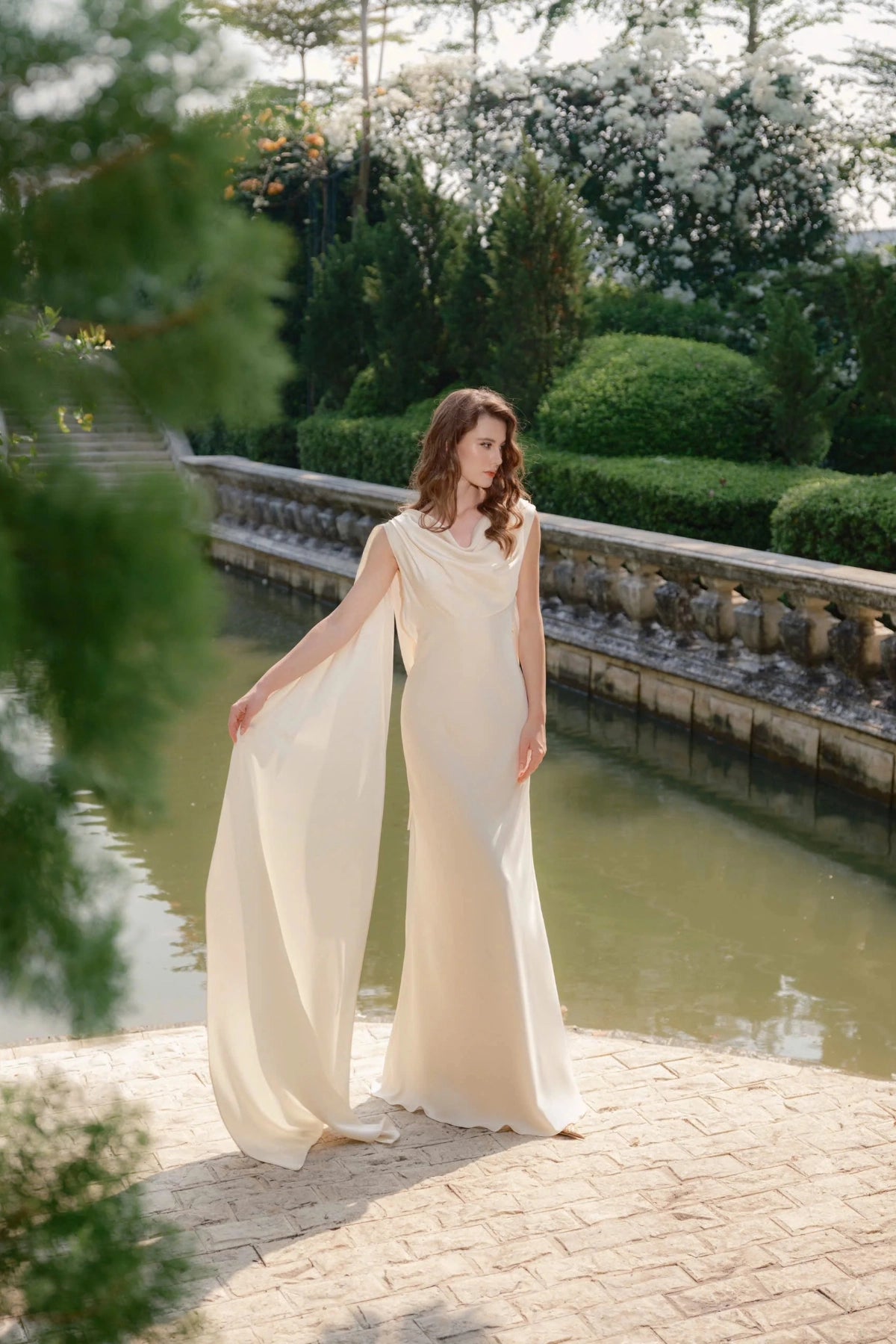 Luxury Sheath Cowl Sleeveless Open Back Floor‑Length Wedding Dress