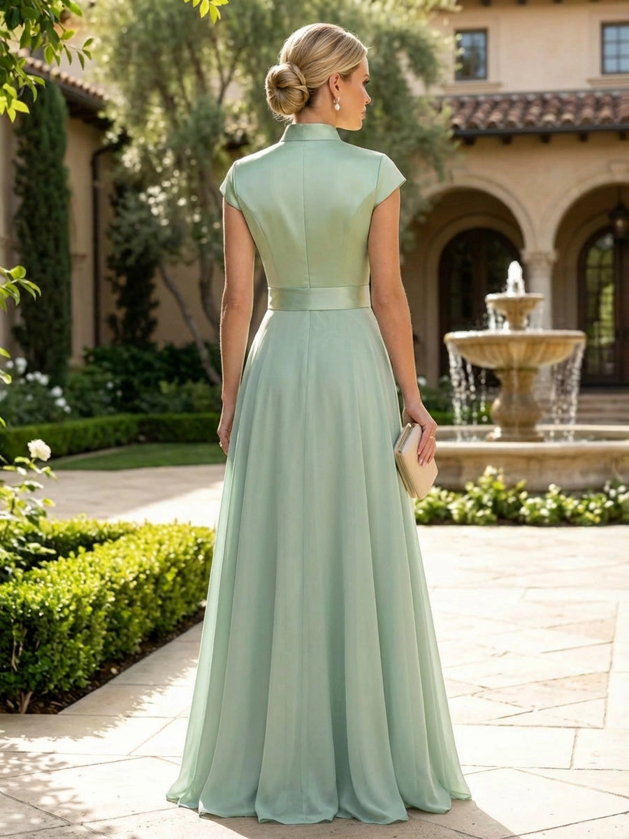 Model wearing vedress sage green stand collar mother of bride dress invisible zip back satin chiffon formal rear view