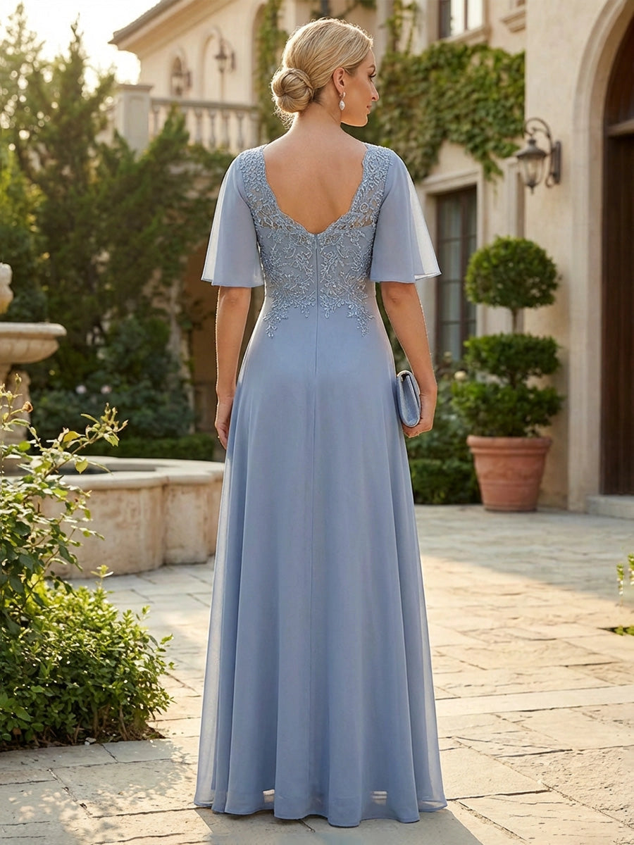 Model wearing vedress dusty blue lace mother of bride dress sweetheart back chiffon long formal gown rear view