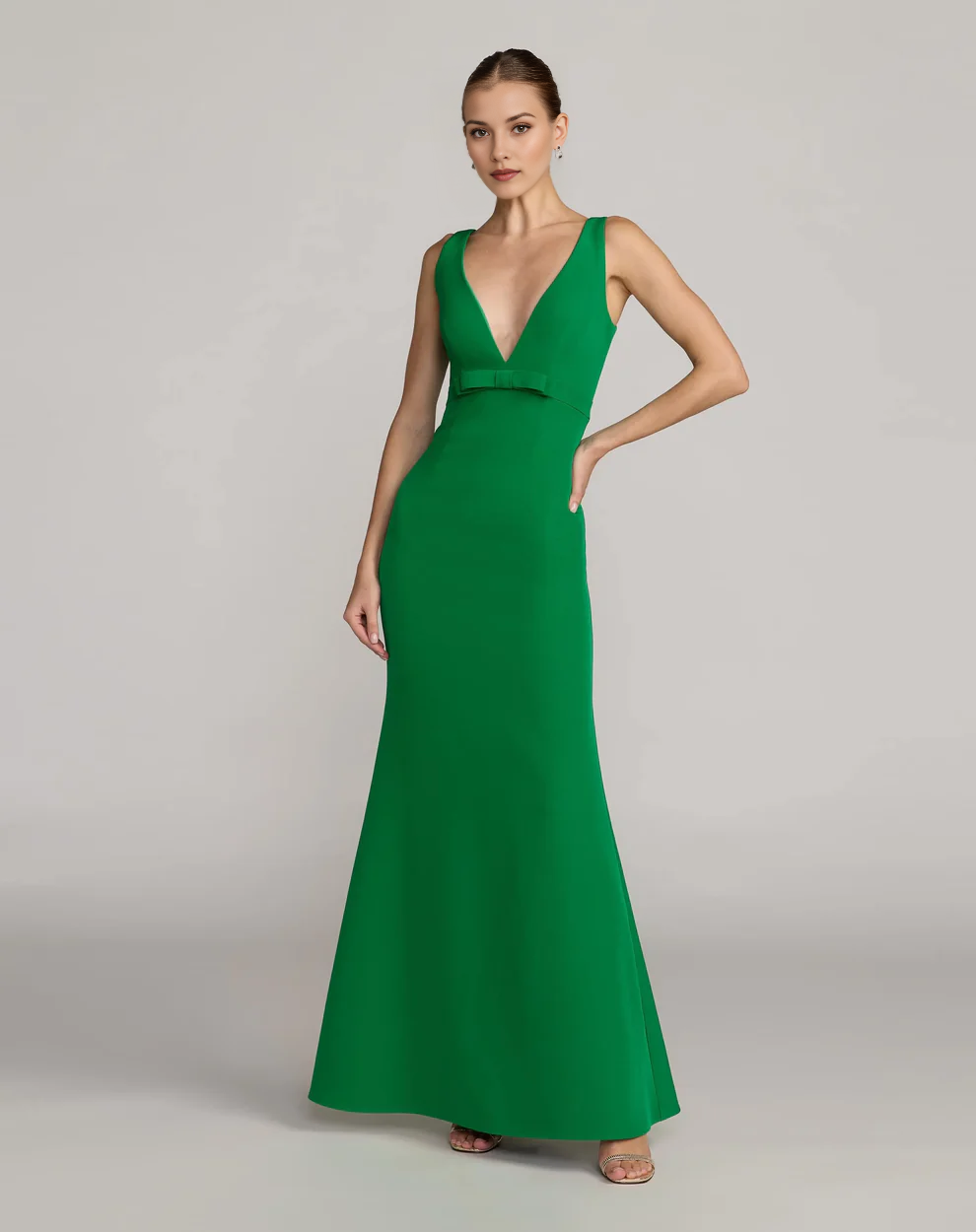 Sleeveless Deep V-Neck Mermaid Gown with Waist Bow Detail