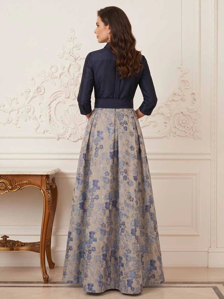 Model wearing vedress navy shirt collar mother of bride dress invisible zip back floral jacquard a line formal rear view