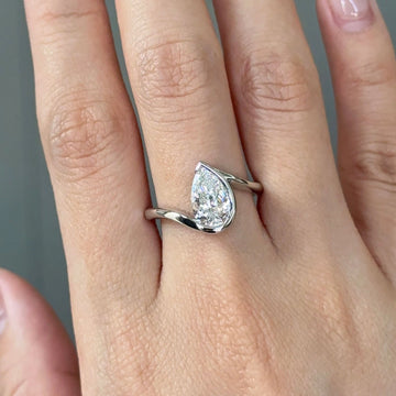 Silver Tone Pear Cut Bezel Bypass Engagement Ring