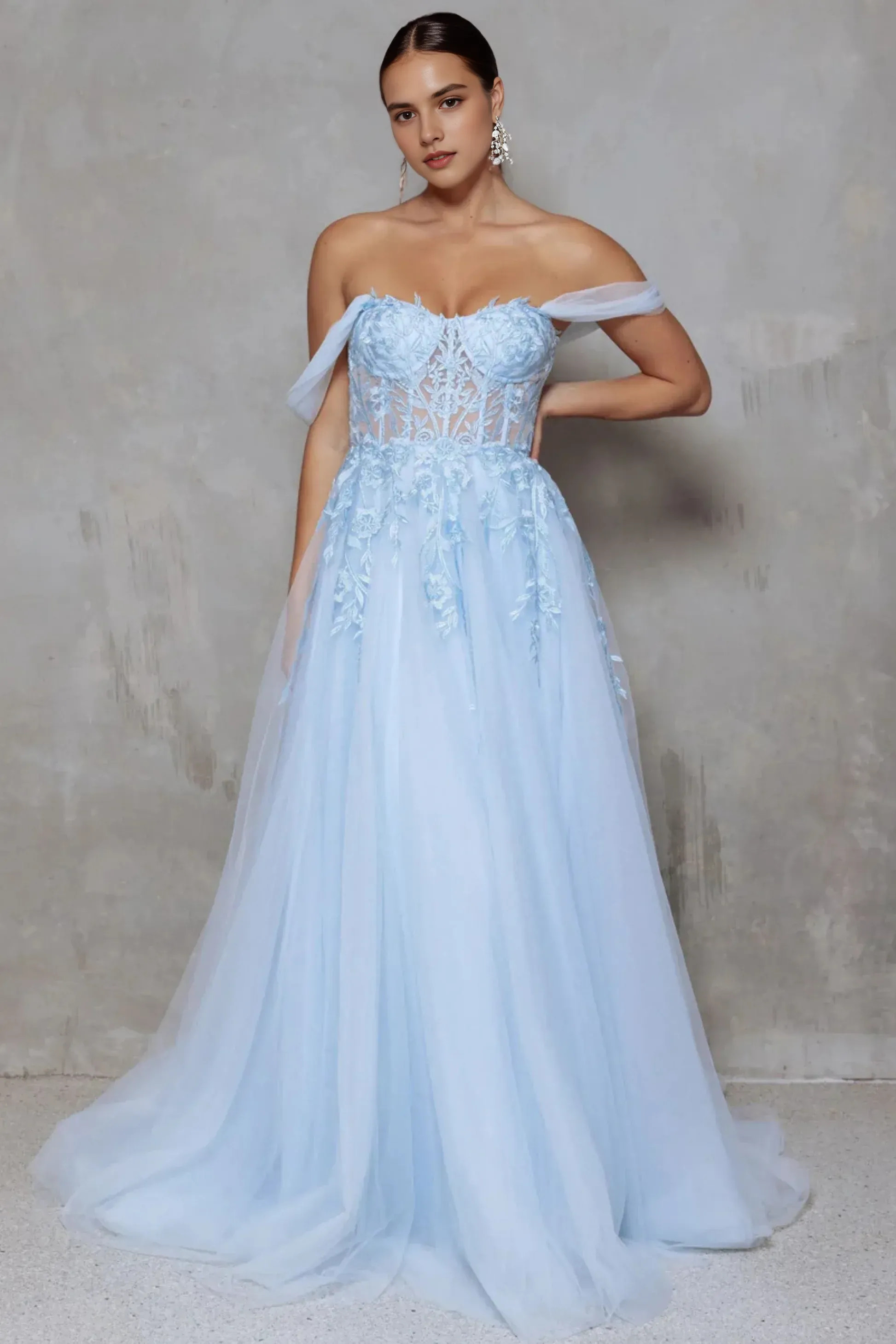 off-shoulder tulle evening dress with sweetheart neckline, sheer corset bodice, floral applique, and flowing A-line skirt