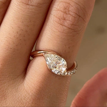 Rose Gold Pear Cut Engagement Ring with Pavé Bypass Band