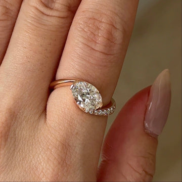 Rose Gold Oval Cut Engagement Ring with Pave Bypass Band
