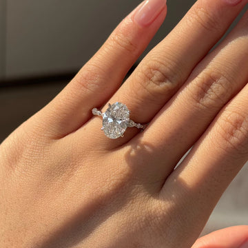 Oval Cut Engagement Ring with Tapered Pavé Side Stones