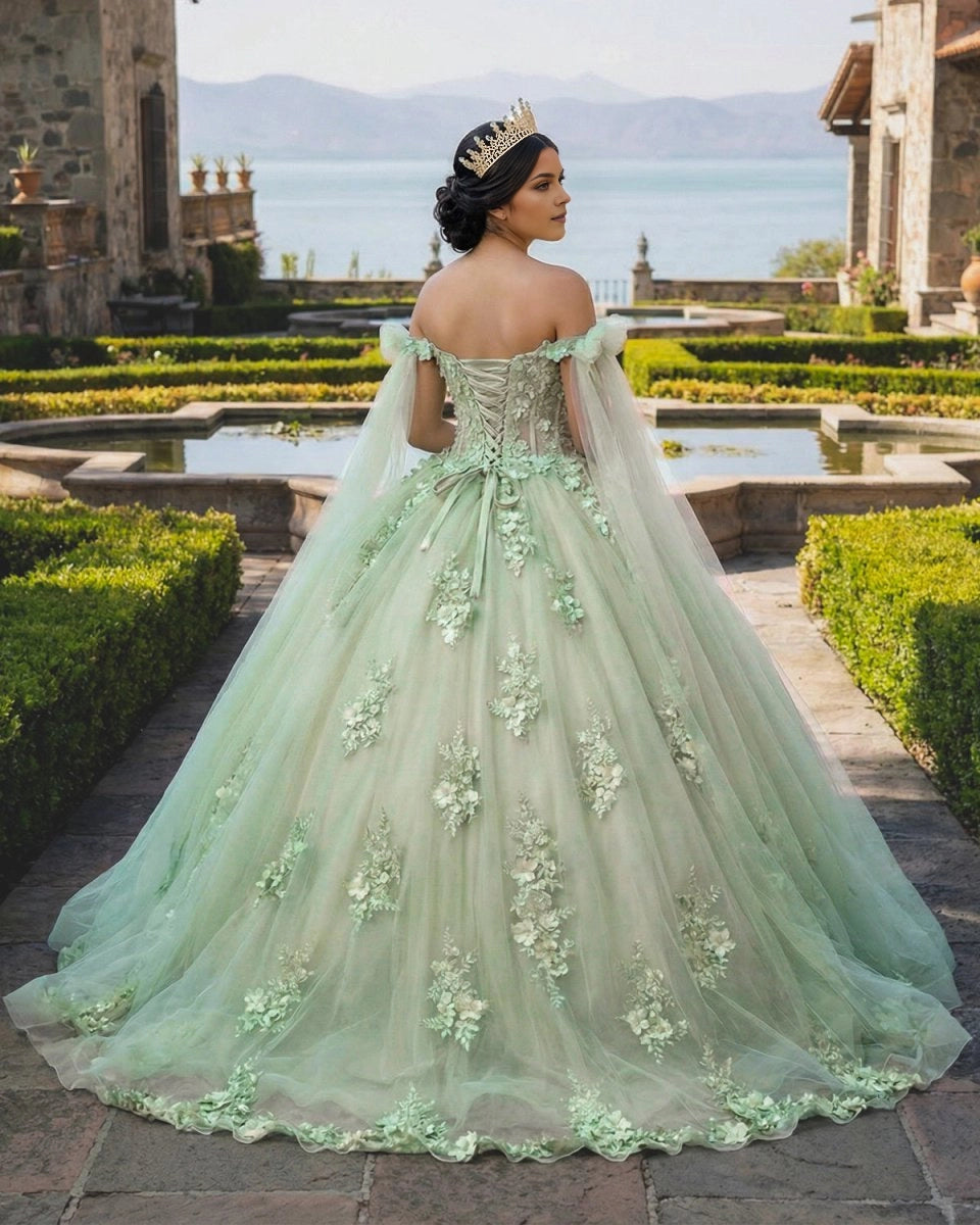 Vedress sage green quinceañera dress lace up corset back, back view with tulle cape sleeves
