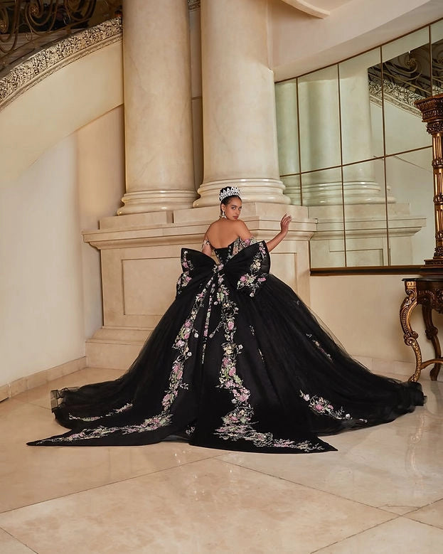 Back view Vedress black quinceanera gown corset lace-up back oversized big bow long train tulle dress