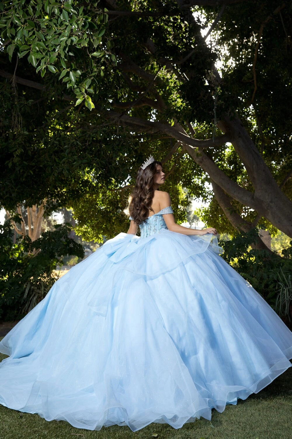 Vedress light blue quinceanera ball gown corset back chapel train large layered bow ruffled glitter tulle off‑shoulder back view