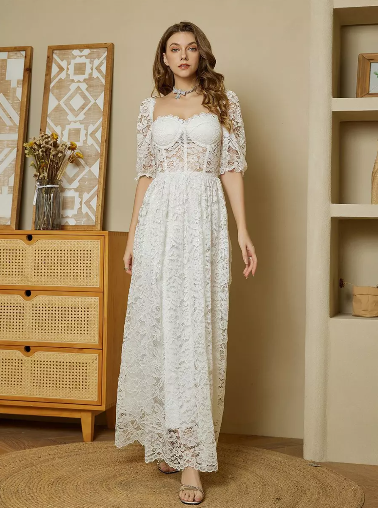 White lace A-line formal dress with square neckline, short lace sleeves, sheer bodice, and flowing maxi skirt by VEDRESS