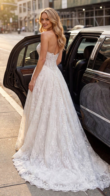 Vedress strapless sweetheart A-line wedding dress front view, allover floral lace scalloped hem city wedding gown