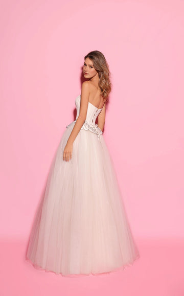 Side back view of a strapless ball gown wedding dress showing the open upper back and lace-up ties