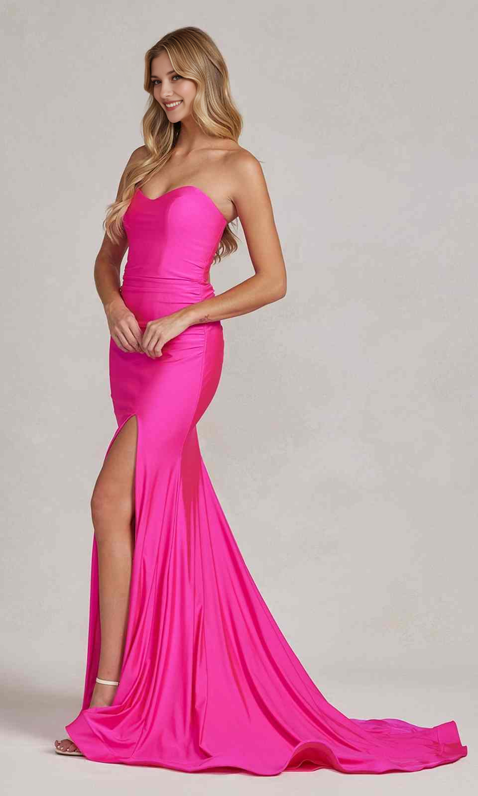 Hot pink strapless sweetheart mermaid prom gown with high slit, satin-look fabric, and soft train by Vedress