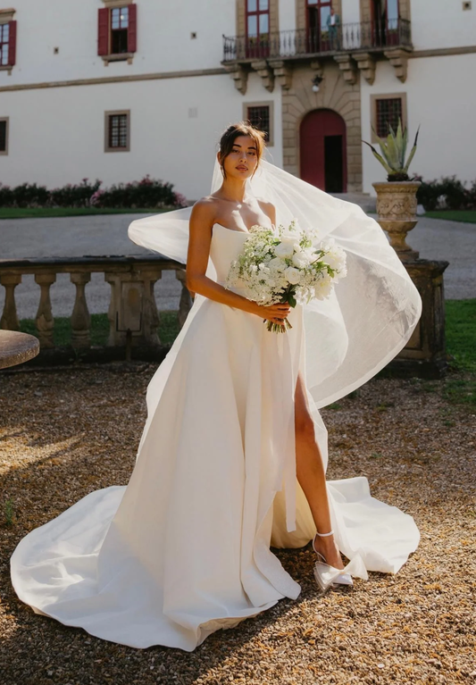 Charming A Line Strapless White Satin Long Wedding Dress with Slit Timeless Strapless Ball Gown for Garden & Outdoor Weddings