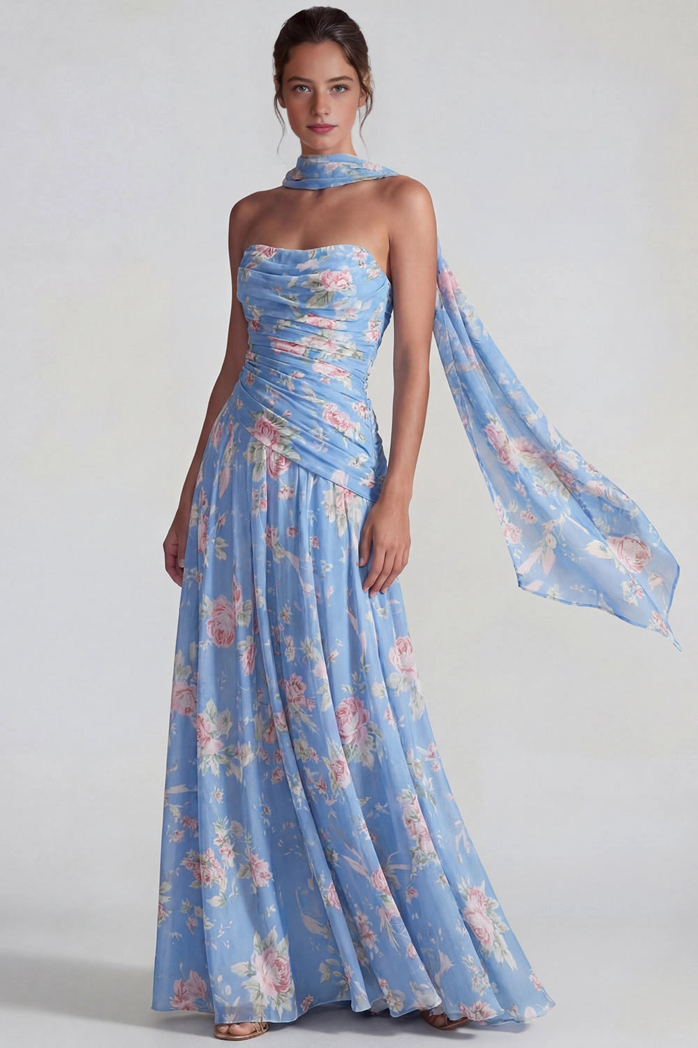 Vedress blue floral strapless flowing maxi wedding guest dress with scarf detail front view