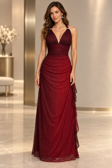 Burgundy glitter mesh evening dress with plunging V-neck halter, ruched waist, sparkling shoulder details and floor-length side ruffles front view