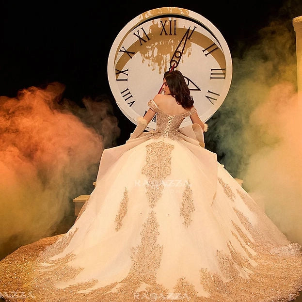 Vedress champagne quinceañera gown corset lace-up back oversized side bow gold lace long train back view