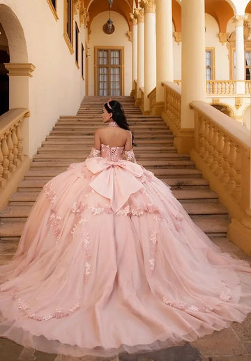 Back view Vedress blush pink quinceanera gown corset lace-up back large satin bow long train with lace hem